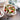 Staub Ceramic 3-Piece Mini Round Cocotte Set Lifestyle Image 8 shows a three colorful mini round cocottes to serve your culinary masterpieces.