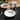Porland Be Happy 4-Piece Cake Plate Set (Know Better) Lifestyle Image 5 offering a blend of sophistication and insightful designs for your desserts.