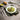 Mepra Stile By Pininarina Brushed Champagne 20-Piece Flatware Set Lifestyle Image 1 shows a meticulously designed with a stunning brushed champagne finish, providing a sophisticated and cohesive dining experience for any occasion.