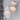 Graypants Scraplights Pebbles Denny Pendant Light Lifestyle Image 1 showing the white light pendant hanging from the ceiling with a white background.