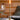 Graypants Wick Portable LED Table Lamp Lifestyle Image 13 shows the Wick Portable LED Table Lamp Brass variant.