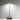 Zafferano Pina Pro 11.4" Cordless Rechargeable Table Lamp Lifestyle Image 1 showing the lamp casts in a warm glow, enhancing the room's ambiance.