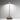 Zafferano Pina Pro 11.4" Cordless Rechargeable Table Lamp Lifestyle Image 1 showing the lamp casts in a warm glow, enhancing the room's ambiance.