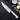 Zwilling Pro Le Blanc 8" Chef's Knife Lifestyle Image 1 shows a versatile kitchen tool known for its sharp blade and elegant white handle, designed for a wide range of chopping, slicing, and dicing tasks in culinary endeavors.