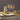 Michael Wainwright Truro Gold Red Wine Glasses Set of 2 Lifestyle Image 1 shows a luxurious gold design that adds a touch of opulence to your stemware collection, perfect for savoring your favorite red wines in style.