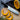 Miyabi Evolution 6.5-inch Nakiri Knife Lifestyle Image 1 shows a precision-crafted culinary tool designed for efficient vegetable preparation. With its razor-sharp blade and ergonomic handle, this knife seamlessly blends Japanese tradition with modern innovation, making it an essential companion for achieving clean and precise cuts in your kitchen.