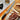 Kramer Euroline Damascus Collection 9-inch Bread Knife Lifestyle Image 2 shows a meticulously crafted blade designed to enhance your kitchen arsenal, delivering unmatched performance and aesthetic appeal.