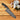 Kramer Euroline Damascus Collection 7-inch Santoku Knife Lifestyle Image 1 featuring a razor-sharp Damascus steel blade and expert craftsmanship for precise and effortless slicing, dicing, and chopping.