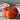 Staub Ceramic 16-oz. Petite Pumpkin Cocotte Lifestyle Image 1 shows a delightful ceramic cocotte in the shape of a pumpkin, ideal for individual servings.