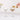 Orrefors Carat Set of 2 Coupe Glasses Lifiestyle Image 1 shows a sophisticated crystal glassware ensemble that combines classic elegance with a modern twist, making it the perfect choice for toasting to special moments.
