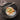 Staub Cast Iron 6-qt Wok - Matte Black Lifestyle Image 1 shows a versatile and spacious cast iron wok perfect for stir-frying, deep-frying, and various asian-inspired dishes.