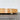 Larch Wood Round Cutting Board Lifestyle Image 1 shows the side view of the product.