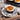 Staub Ceramic 3-Piece Mini Round Cocotte Set Lifestyle Image 6 shows a mini round cocottes in different colors, ideal for creative presentations.